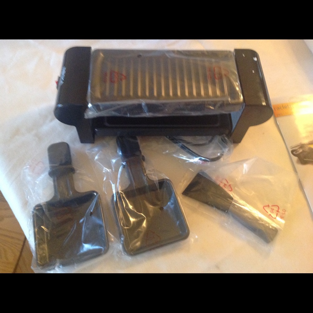 Boska. Raclette mini  cheese, meat, fish gourmet